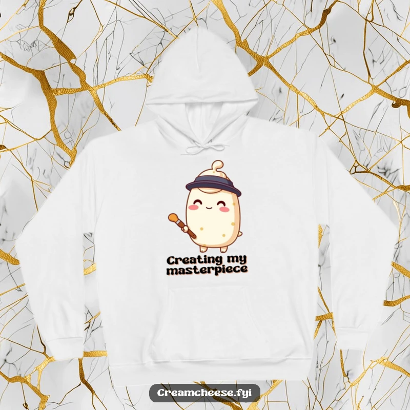 Funny cream cheese painter hoodie, a stylized character holding a tiny paintbrush, offering creative warmth.
