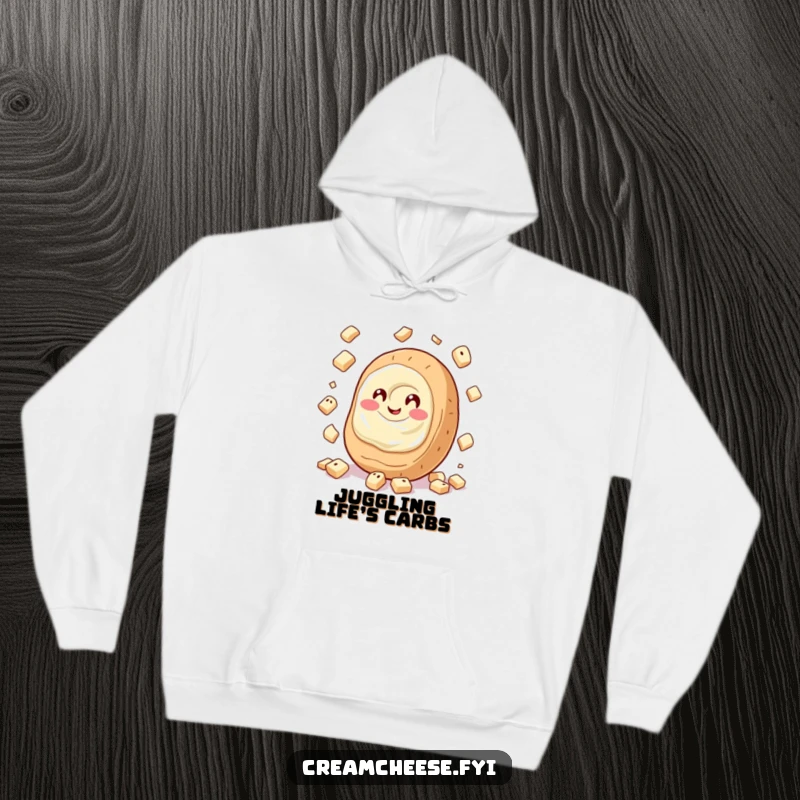 Funny Cream Cheese Hoodie depicting a giggling cream cheese spread masterfully juggling tiny bagel pieces, perfect for cozy, humorous days.