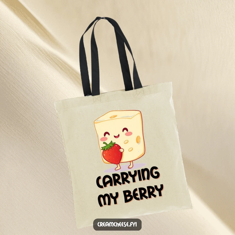 Funny Cream Cheese Tote Bag showcasing a cheerful cream cheese slice tiptoeing with a strawberry, a humorous and charming accessory for daily use.
