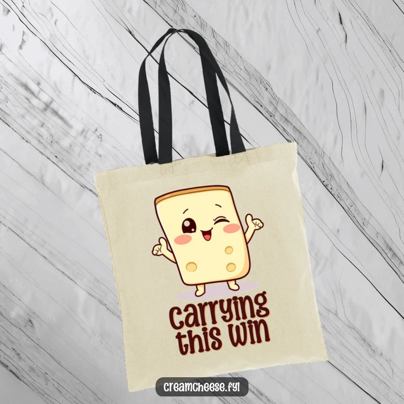 Funny tote bag featuring a winking cream cheese wedge doing a triumphant pose, perfect for carrying groceries.