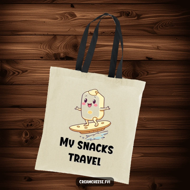 Funny Cream Cheese Tote Bag: A happy cream cheese character surfs on a giant cracker, ideal for carrying groceries, snacks, or beach essentials.