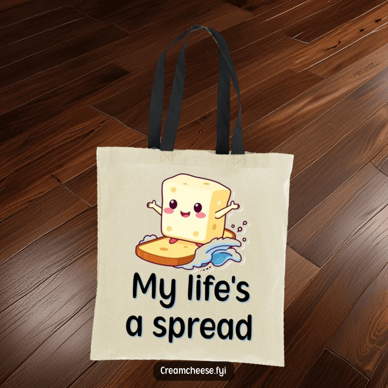 Funny tote bag featuring a happy cream cheese block gracefully surfing atop a golden toast wave, a perfect blend of food humor and adventure.
